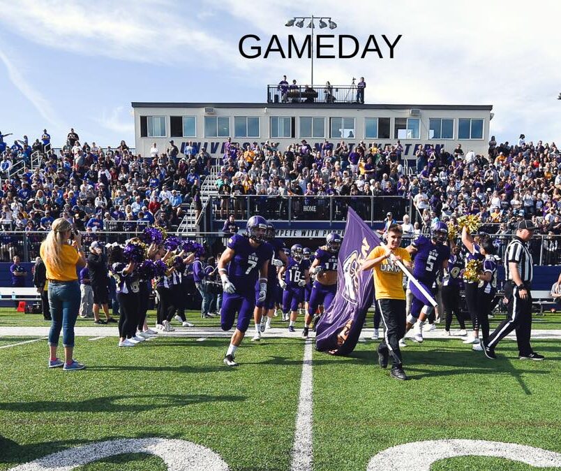 Moments by Danielle Nicole Taking Photos at UNW Football Game Day as Lead Team Photographer.