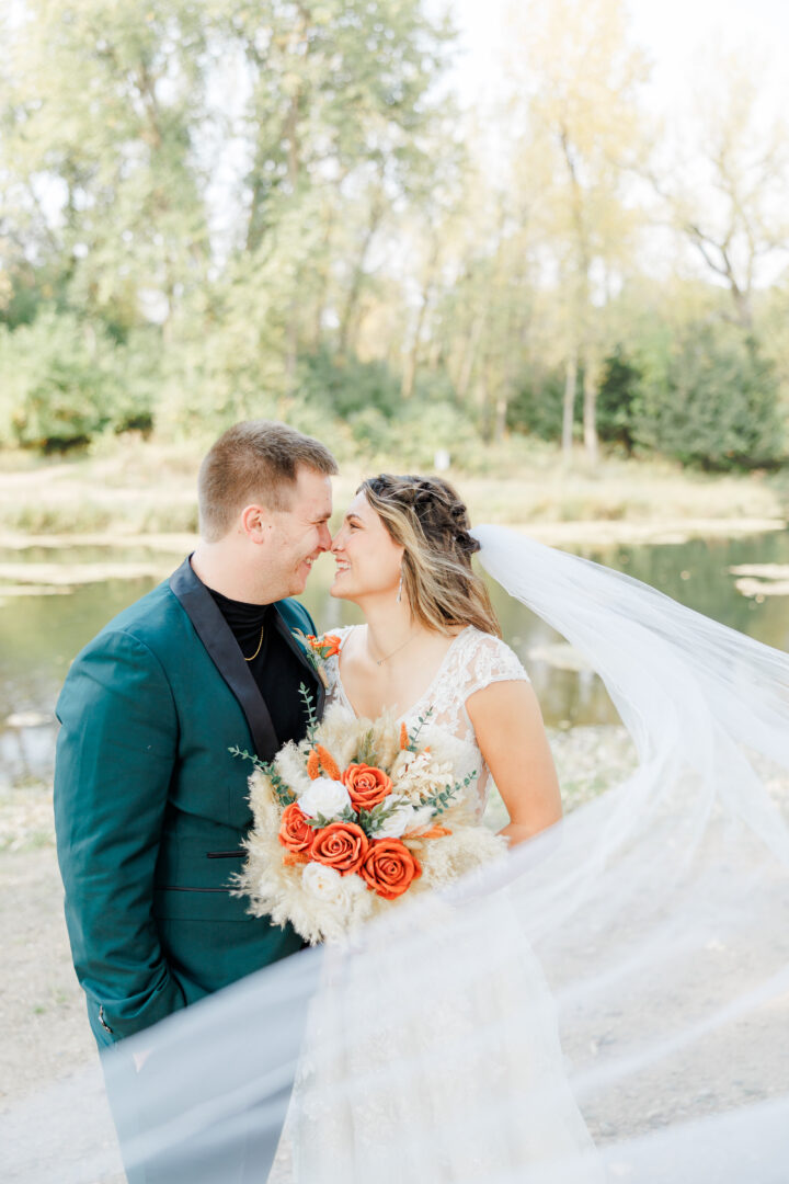 bridal portraits of couple at lake elsie in gary sd