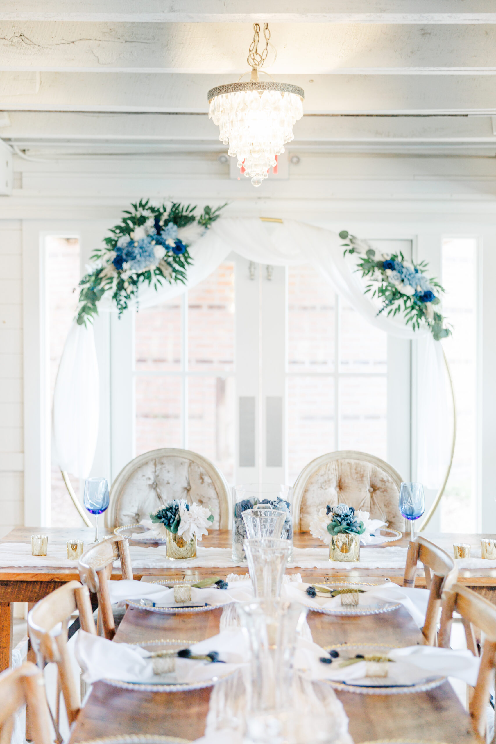 Beautiful head table at historic barn reception hall