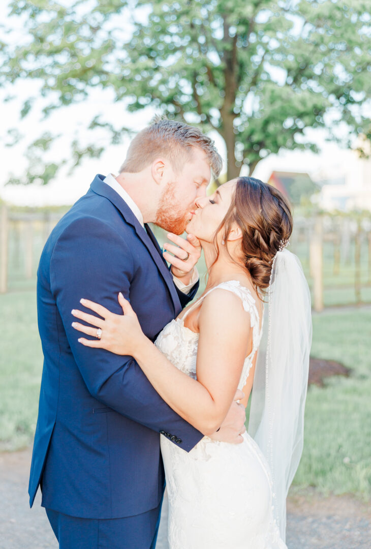 Sunset photos of bride and groom at Redeemed Farm in Scandia, MN