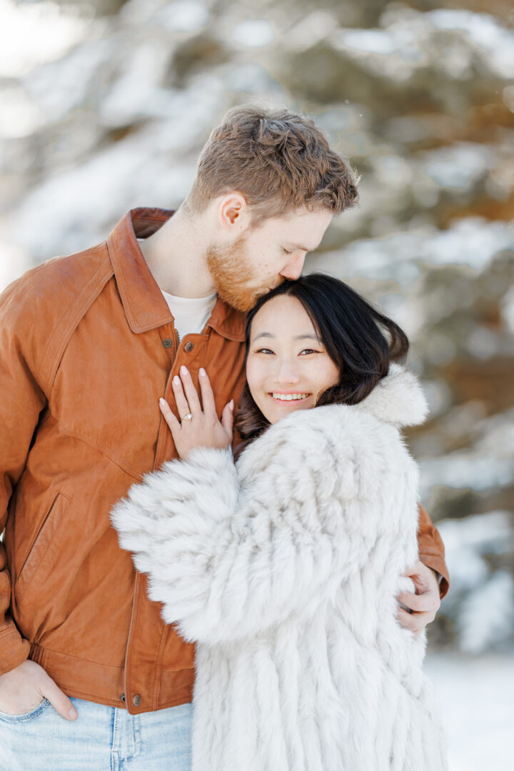 clear lake winter engagement session in the snow at moments by danielle nicole studios