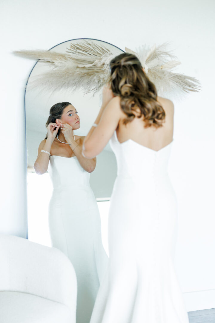 bride getting ready at barn at aspen acres wedding