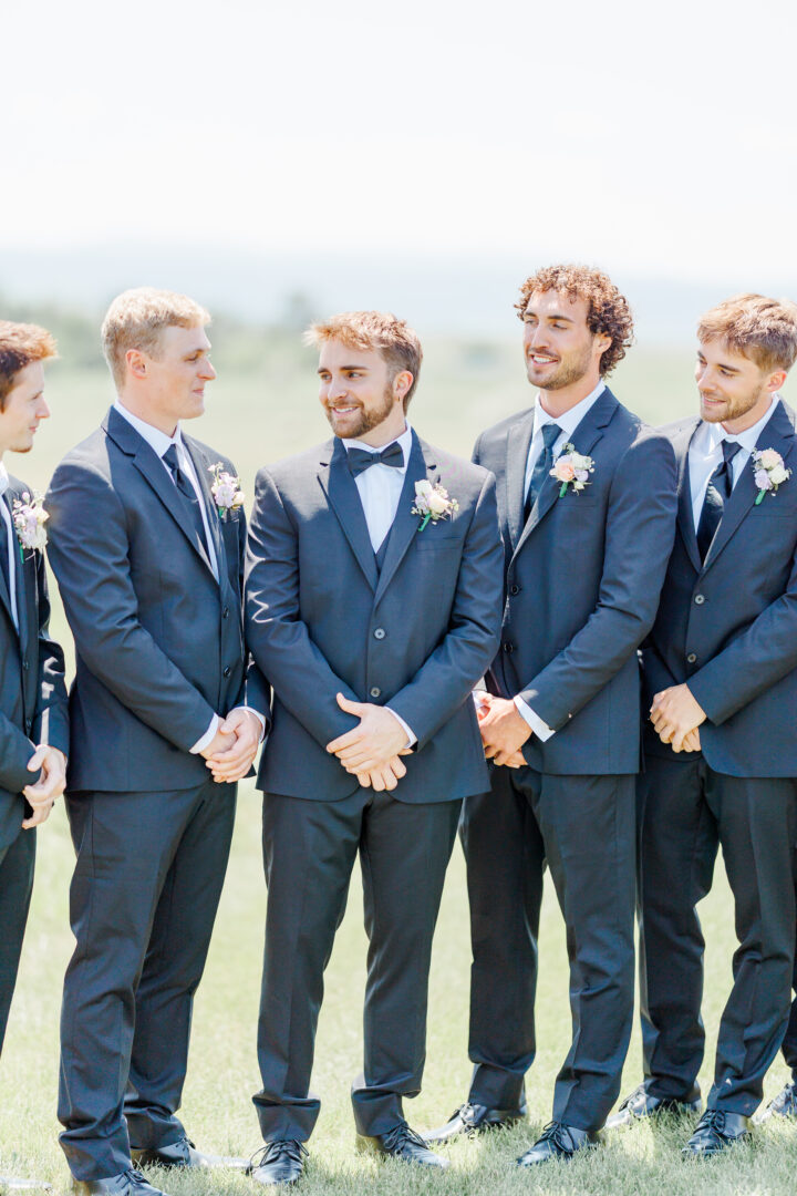groom and groomsmen at the barn at aspen acres wedding