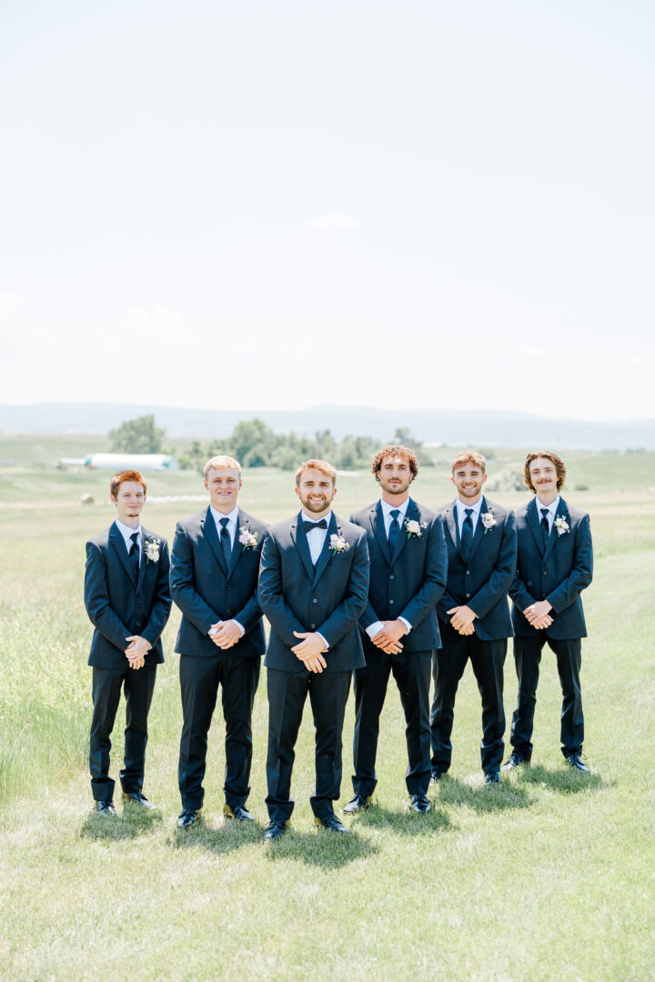 groom and groomsmen at the barn at aspen acres wedding