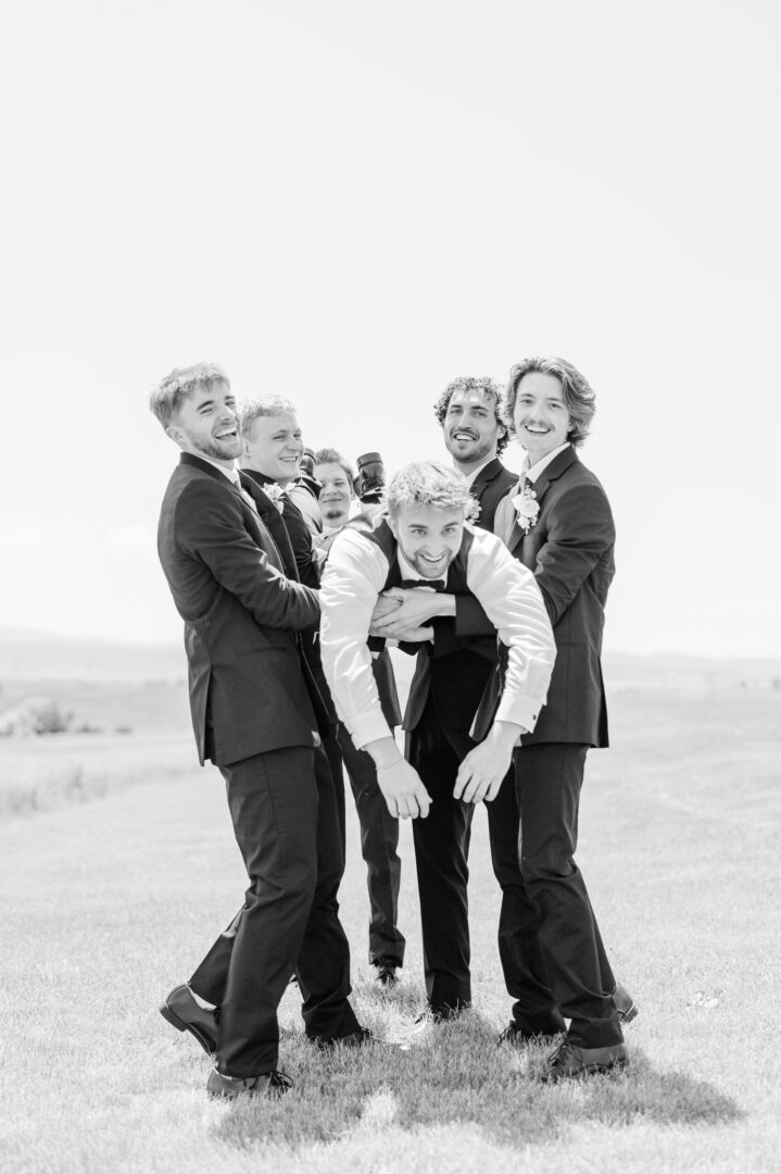 groom and groomsmen at the barn at aspen acres wedding