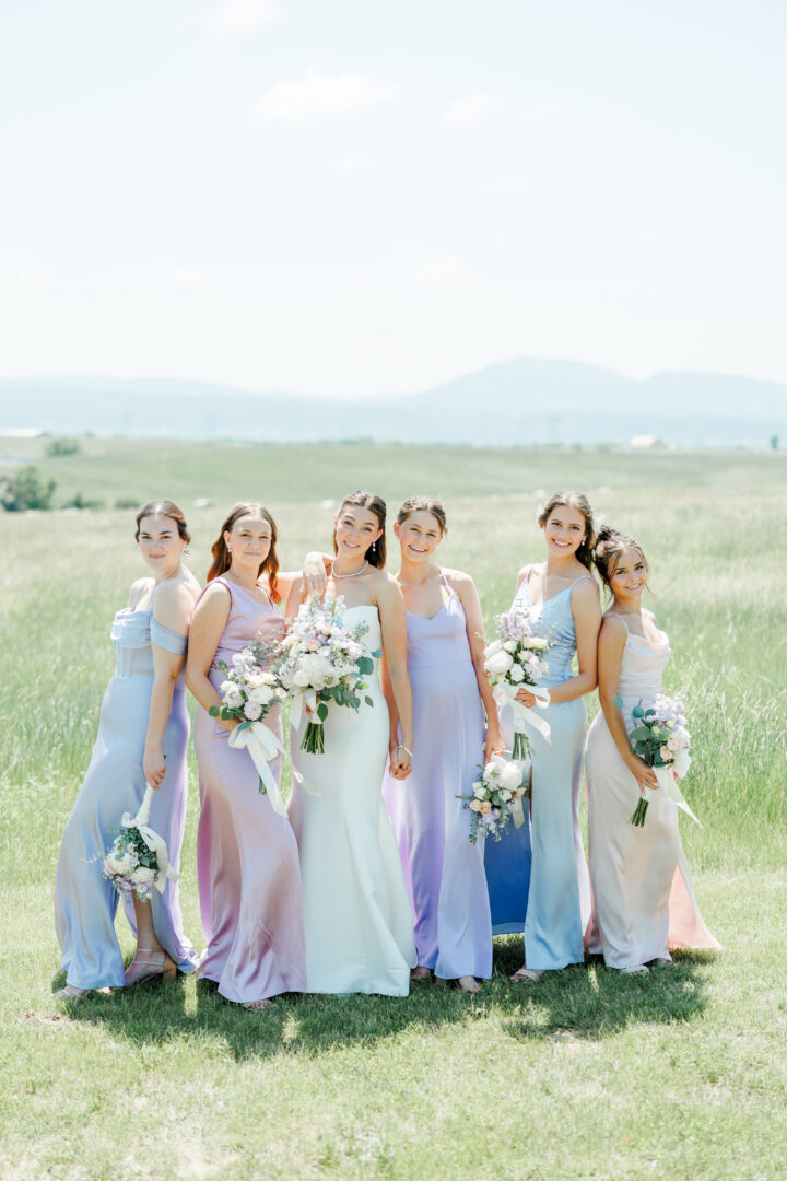 bride and bridesmaids at the barn at aspen acres wedding