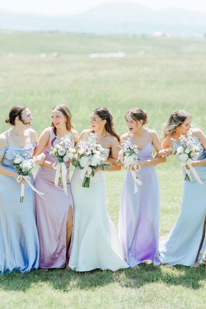bride and bridesmaids at the barn at aspen acres wedding