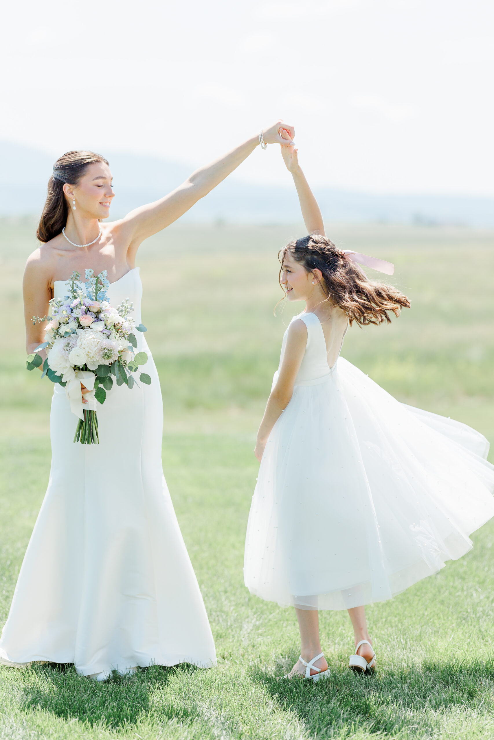 bride and bridesmaids at the barn at aspen acres wedding
