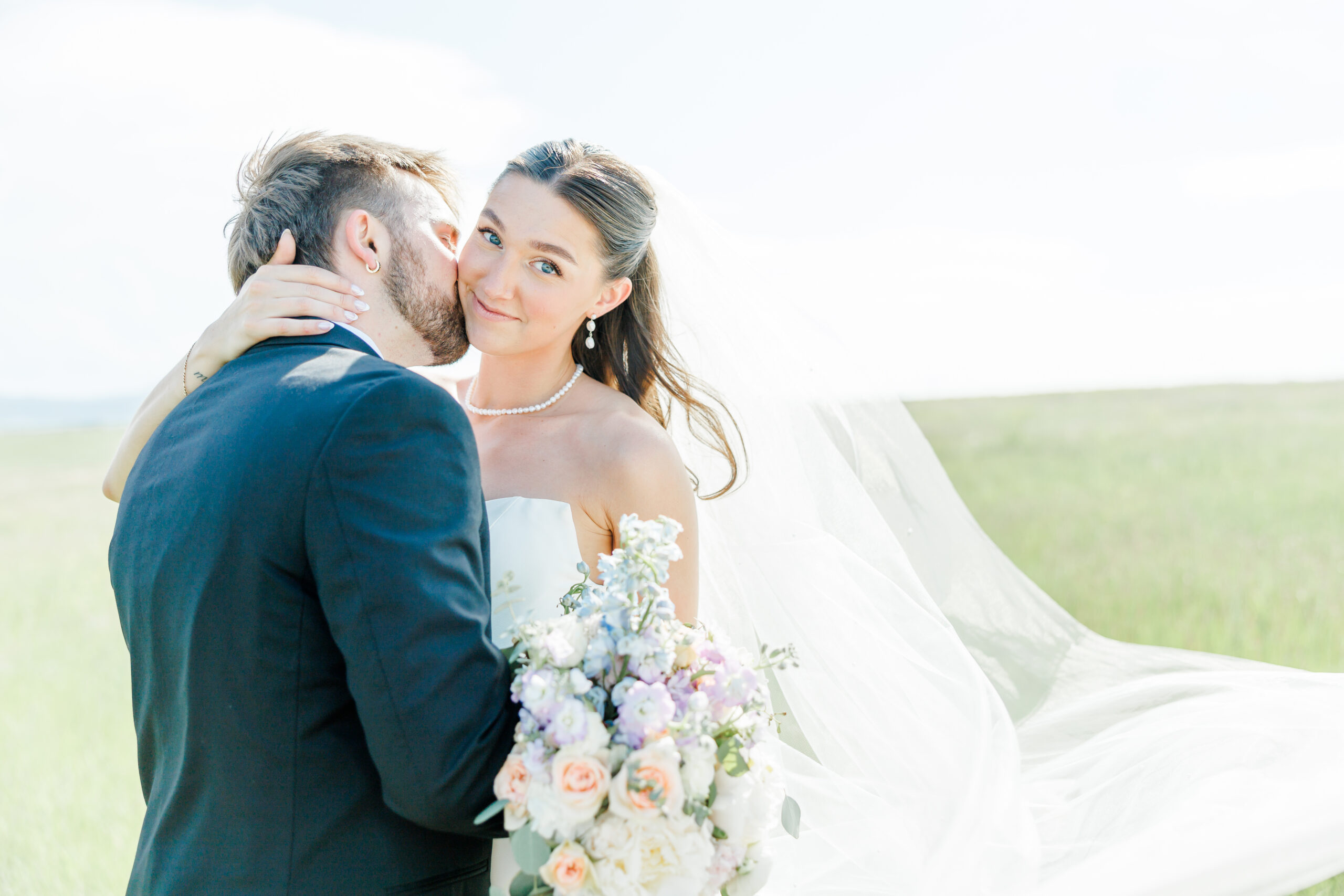 bride and groom at the barn at aspen acres wedding portraits