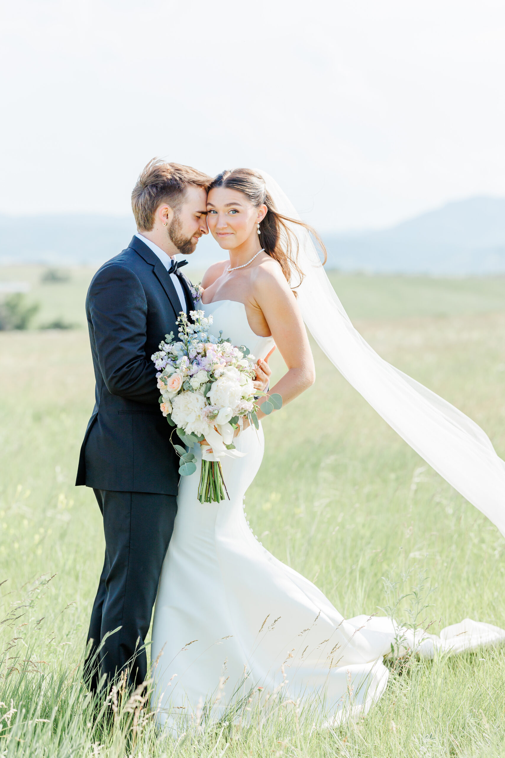 bride and groom at the barn at aspen acres wedding portraits