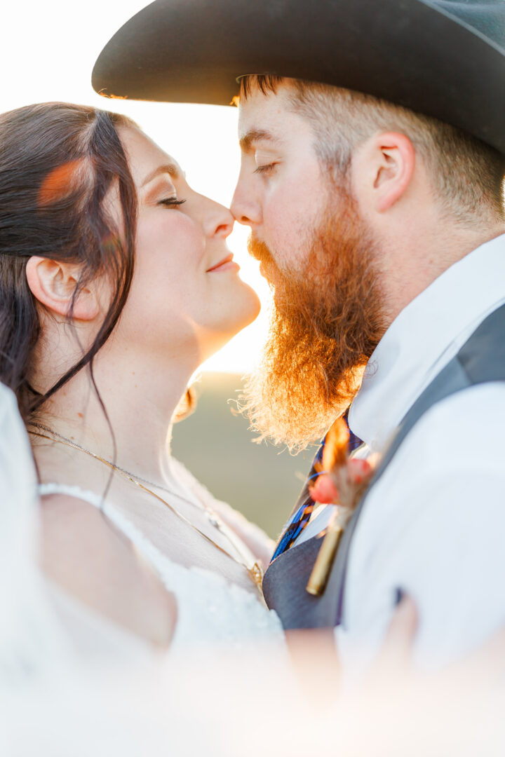 sunset photos of wedding couple at stable waters ranch