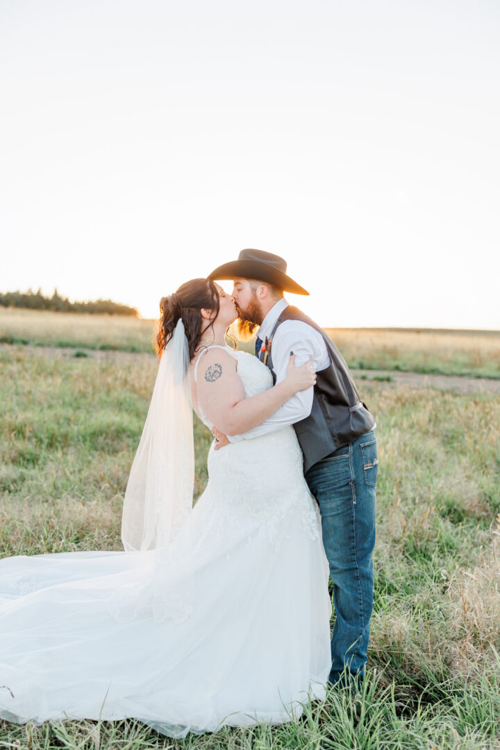 sunset photos of wedding couple at stable waters ranch