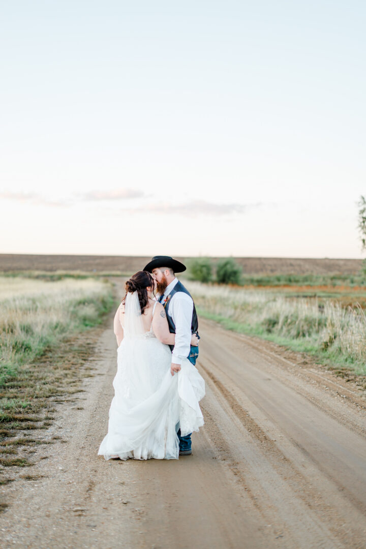 sunset photos of wedding couple at stable waters ranch