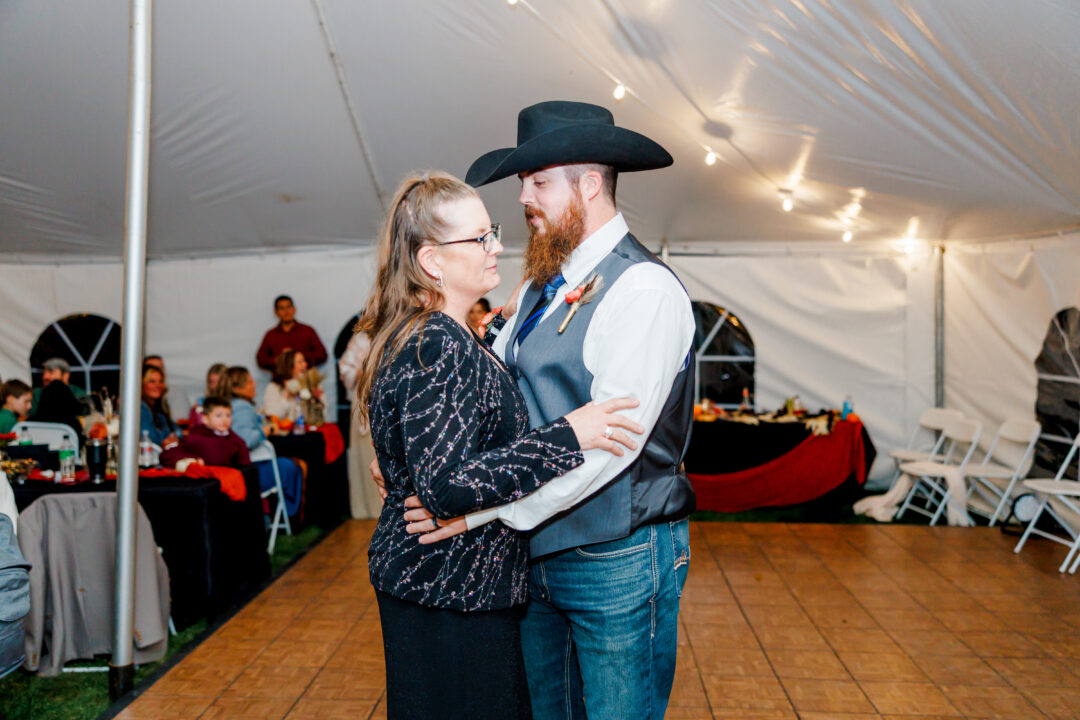 wedding reception in tent at stable waters ranch