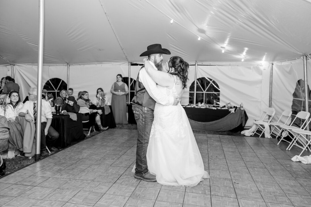 wedding reception in tent at stable waters ranch