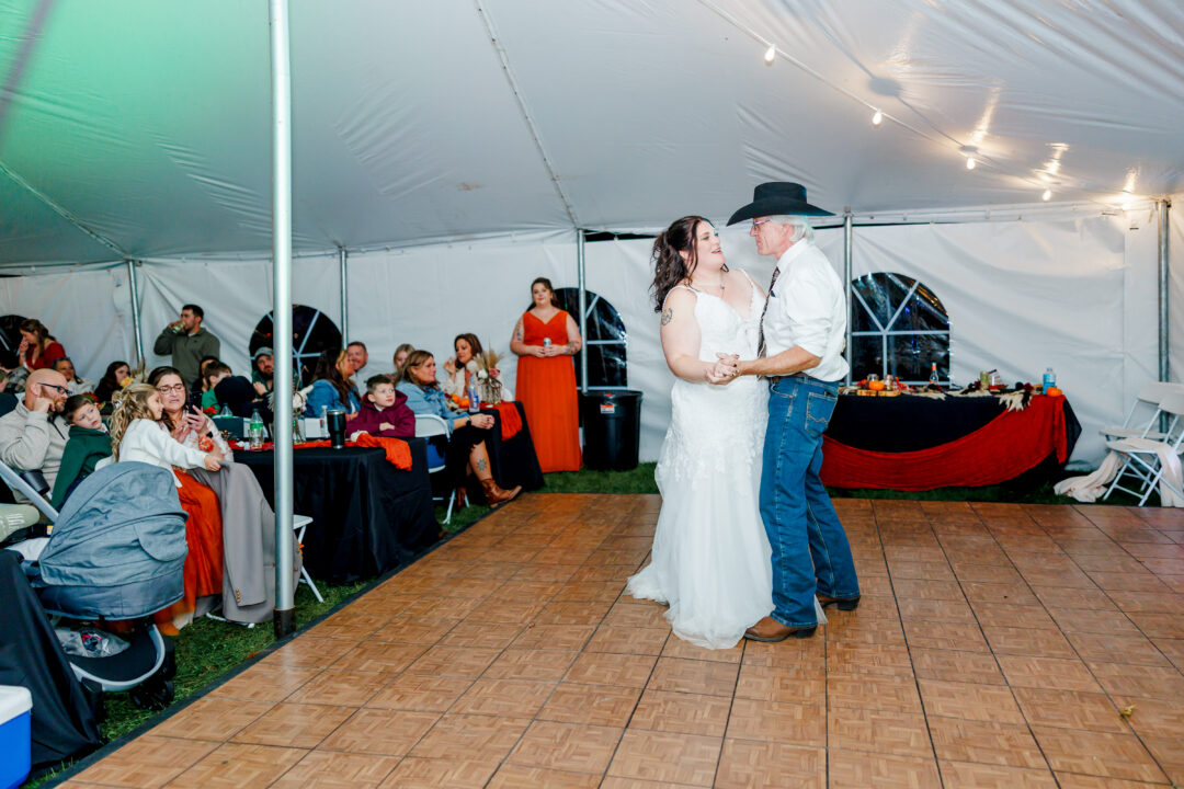 wedding reception in tent at stable waters ranch