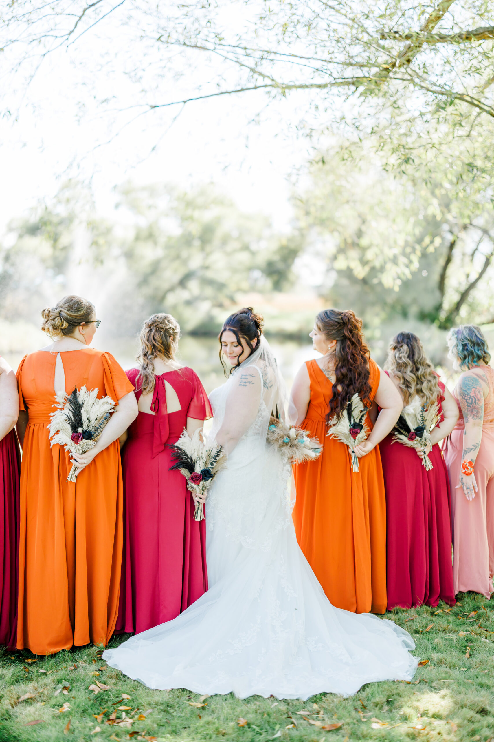 portraits of bride and bridesmaids at stable waters ranch
